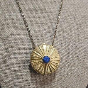 Estee Lauder Gold Sunburst Necklace with Blue Center